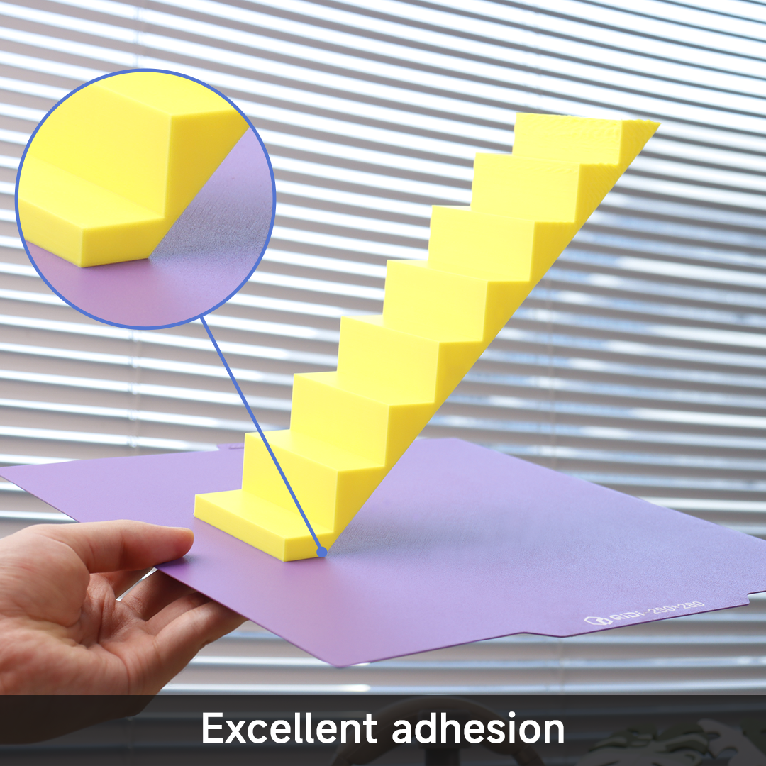 QIDI Cool Plate Pro demonstrating excellent adhesion with a yellow staircase print on a purple build plate.